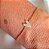 PULSEIRA CORAÇAO COM ZIRCONIAS BANHADA A OURO 18K - Imagem 1