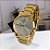 RELOGIO FEMININO DOURADO CHAMPION FUNDO COM DETALHES PEDRAS CN24435G - Imagem 1