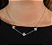 Conjunto de Flor Cravejado em Micro Zircônias em Rhodium Branco - Imagem 3