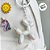 Chaveiro Metal - Cachorro Balão - Branco Furta-Cor - 5x4,5cm - 1 unidade - Rizzo - Imagem 4