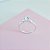 Anel Solitário 4 Garras Zirconia 5mm e Micro Zirconia Lateral Prata 925 - Imagem 1