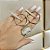 Brinco Longo Circulo Liso Vazado Com Cascata Cravejada   - Banhado a Ouro 18K - Semijoia - Imagem 2
