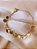 PULSEIRA MOEDAS LUX DOURADA - Imagem 1