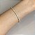 Pulseira riviera cravejada zircônias carrê na cor cristal 2mm de espessura e 18cm de comprimento com banho de ouro 18k - Imagem 2