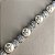 Pulseira cravejada zircônias na cor cristal e pérolas shell 19cm de comprimento com banho de ródio branco - Imagem 6