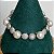 Pulseira cravejada zircônias na cor cristal e pérolas shell 19cm de comprimento com banho de ródio branco - Imagem 1