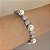 Pulseira cravejada zircônias na cor cristal e pérolas shell 19cm de comprimento com banho de ródio branco - Imagem 2