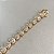 Pulseira riviera em formato de mini corações cravejados com zircônias na cor cristal 18cm de comprimento com banho de ouro 18k - Imagem 13