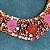 Colar riviera festa cravejado com zircônias (em tons de vermelho e rosa) com banho de ouro 18k - Imagem 9