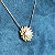 Colar com pingente de flor com pérola shell e cravejada com zircônias na cor cristal com banho de ouro 18k - Imagem 14