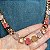 Conjunto brinco e colar cravejado com zircônias em formato de coração em degradê tons de coral com banho de ouro 18k - Imagem 6