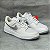NIKE AIR FORCE 1 LOW UNITY (BRANCO E PRATA) - Imagem 1
