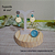 BRINCO PENDENTE COM RESINA OFF-WHITE E TURQUESA - Imagem 2
