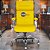 Cadeira Original Eames Presidente com Rodinhas Cromadas e Anti Risco Linha Capa em Madeira Amarelo - Imagem 2