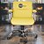 Cadeira Original Eames Diretor com Rodinhas Cromadas e Anti Risco Linha Capa em Madeira Amarelo - Imagem 2