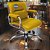 Cadeira Original Eames Diretor com Rodinhas Cromadas e Anti Risco Linha Capa em Madeira Amarelo Mostarda - Imagem 1