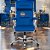 Cadeira Original Eames Presidente com Rodinhas Cromadas e Anti Risco Linha Capa em Madeira Escura - Azul Royal - Imagem 2
