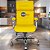 Cadeira Original Eames Presidente com Rodinhas Cromadas e Anti Risco Linha Capa em Madeira Clara - Amarelo - Imagem 2