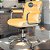 Cadeira Original Eames Diretor com Rodinhas Cromadas e Anti Risco Linha Capa em Madeira Clara - Amarelo - Imagem 1