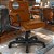 Cadeira Original Eames Diretor com Rodinhas Black e Anti Risco Linha Capa em Madeira Escura - Caramelo - Imagem 1