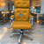 Cadeira Original Eames Presidente com Rodinhas Cromadas e Anti Risco Linha Capa em Madeira Escura ou Clara - Amarelo Mostarda - Imagem 1