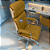 Cadeira Original Eames Presidente com Rodinhas Cromadas e Anti Risco Linha Capa em Madeira Escura ou Clara - Amarelo Mostarda - Imagem 2