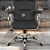 Cadeira Original Eames Diretor com Rodinhas Cromadas e Anti Risco Linha Capa em Madeira Escura Cinza Escuro - Imagem 1