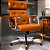 Cadeira Design Office Eames Signature Presidente Cromada com Rodinhas - Anti Risco - Capa em Madeira - Marrom - Imagem 2