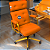Cadeira Design Office Eames Signature Presidente Dourada com Rodinhas - Anti Risco - Capa em Madeira - Laranja - Imagem 1