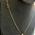 Corrente Piastrine 2mm 50cm + Pingente Cruz – Banhada a Ouro 18K - Imagem 2