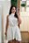 Vestido evasê amarração off white - Imagem 9