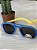 OCULOS DE SOL SILICONE AZUL C/ AMARELO (RAIBAN) - Imagem 1