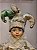 BONECO PIERROT SENTADO C/ MÚSICA VERDE E CHAMPANHE 42,5CM - Imagem 2