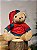 URSO SENTADO COM GORRO VERMELHO 25CM - Imagem 1