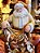 PAPAI NOEL COM PRESENTES DOURADO E BRANCO 32CM - PRÉ VENDA 2025 - Imagem 2