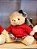 URSO MENINA SENTADA COM SUETER VERMELHO 20CM - PRÉ VENDA 2025 - Imagem 1