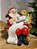 PAPAI NOEL SENTADA NA POLTRONA COM CACHORRO 19CM - Imagem 4