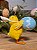 PINTINHO SEGURANDO OVO 12CM - Imagem 2