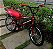 BICICLETA ARO (20) MASCULINA COR CROMOCOLOR VERMELHO S/MARCHA FREIO V-BRAKE MARCA MILANO FREESTYLE TIPO MONTADINHA - Imagem 4