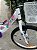 BICICLETA ARO (20) FEMININA CALOI CECI S/ MARCHA FREIO V-BRAKE COM CESTA COR BRANCO/ROXO - Imagem 4