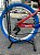 BICICLETA MTB FREERIDE ARO (26) VIKINGX TUFF-25 CAMBIO 8 VELOCIDADES FREIO DISC HIDRAULICO COR VERMELHO/AZUL/AMARELO - Imagem 4