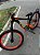 BICICLETA MTB FREERIDE ARO (26) HUPI NAJA KIT SINGLE S/ MARCHA FREIO DISC HIDRÁULICO TRASEIRO SHIMANO COR PRETO/LARANJA - Imagem 9