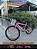 BICICLETA ARO (26) FEMININA COR ROSA CLARO SEM MARCHA MARCA MILANO QUADRO REBAIXADO COM CESTA - Imagem 1