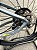 BICICLETA MTB ARO (29) OGGI HACKER HDS SHIMANO ESSA 8V FREIO DISC HIDRÁULICO TAMANHO 15 (P) COR GRAF/AMAR/PTO - Imagem 9