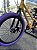 BICICLETA ARO (20) MTB COLLI GRAUZINHA 7 VELOCIDADES (1X7) FREIO A DISCO MECÂNICO COR AMARELO PNEU ROXO - Imagem 8