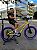 BICICLETA ARO (20) MTB COLLI GRAUZINHA 7 VELOCIDADES (1X7) FREIO A DISCO MECÂNICO COR AMARELO PNEU ROXO - Imagem 1