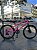 BICICLETA ARO (24) MTB FEMININA COLLI AIRON 7 VELOCIDADES (1X7) FREIO A DISCO MECÂNICO COR ROSA NEON - Imagem 1