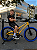 BICICLETA ARO (20) MTB COLLI GRAUZINHA 7 VELOCIDADES (1X7) FREIO A DISCO MECÂNICO COR AMARELO PNEU AZUL - Imagem 1