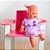 Boneca Judy Faz Sons de Bebe fofinha e cheirosa + acessórios - Imagem 2