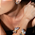 Conjunto de brinco e pulseira de borboleta esmaltado com zirconia banho em ouro 18k - Imagem 2